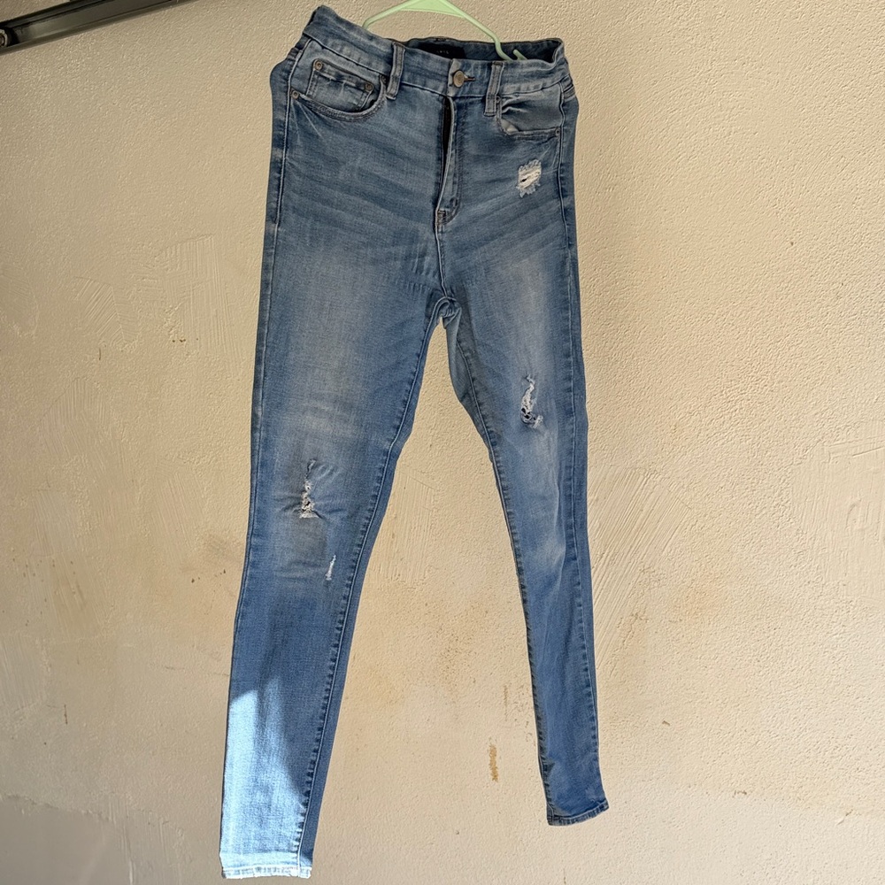 High-Rise Light Blue Distressed Skinny Jeans